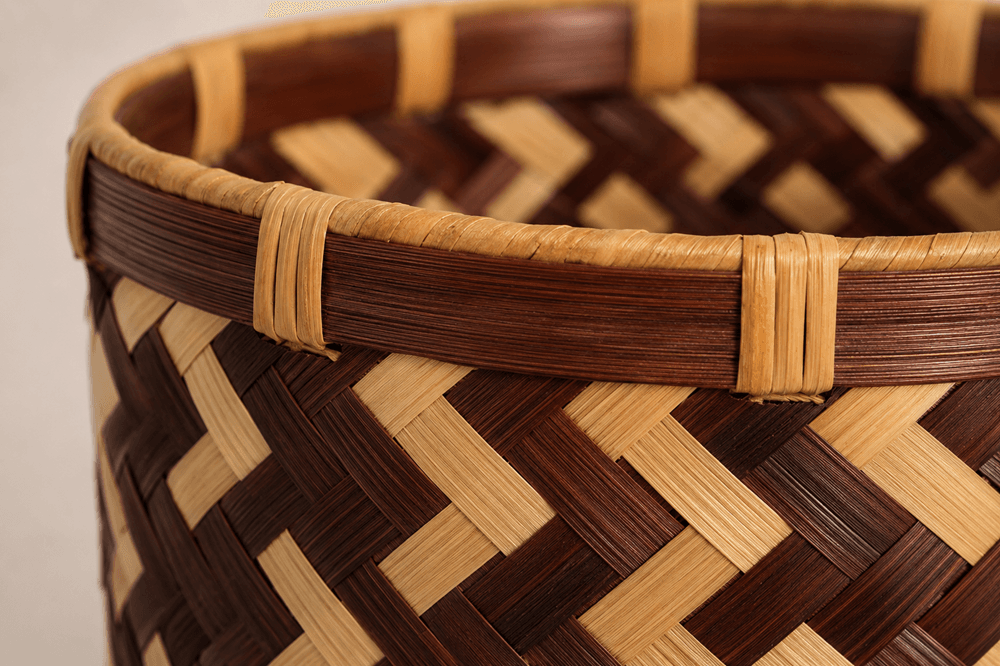 Detail of handwoven natural fibre basket weave and rim finish